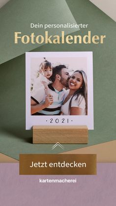 a wooden block with a photo on it and the words fotokalender next to it