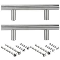 stainless steel cabinet pulls and screws on a white background