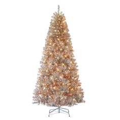 a white christmas tree with lights on it