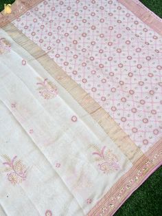 Khinkhwab introduces beautiful Lucknowi Chikankari work. This traditional embroidery style is one of Lucknow’s most ancient and well-known art forms, introduced by the Mughals. Blending shimmer and grace, our new collection of Chikankari Chanderi Sarees are definitely a head-turner for the upcoming festive season! This masterpiece is delicate and inspiring with its embroidery and striking embellishments. As you adorn on this Chanderi saree, it will give you an endearing and beauteous persona. So what are you waiting for? Order our latest collection as they are handpicked and limited! Fabric: Pure Chanderi Craftsmanship: Chikankari Note- There may be slight color variations due to photographic reasons. This is a hand-woven product and any irregularities in the weaving or pattern should not White Chanderi Traditional Wear With Intricate Embroidery, Embroidered Tussar Silk Sharara For Eid, Transitional Tussar Silk Sharara With Embroidery, Transitional Embroidered Tussar Silk Sharara, Transitional Tussar Silk Embroidered Sharara, Unstitched Jamawar Fabric With Embroidered Border, Embroidered Unstitched Sharara In Tussar Silk, Embroidered Mulmul Sharara With Traditional Drape, Festive Sharara With Chikankari Embroidery In Raw Silk