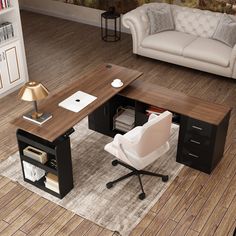 a computer desk sitting on top of a hard wood floor next to a couch and chair