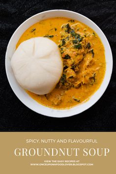 a white bowl filled with food on top of a black table