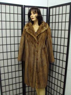 "ATTRACTIVE AND ELEGANT PASTEL MINK FUR COAT FOR LADIES. IT IS CREATED WITH CANADIAN MINK FUR SKINS, WORKED \"LET OUT\".  IT IS ACCENTUATED WITH NOTCH COLLAR, FRONT BUTTON CLOSURE AND HAS 2 SIDE POCKETS. THIS ITEM IS PRE-OWNED: THE FUR AND INSIDE LINING ARE IN MINT CONDITION, THE SECOND BEST CONDITION. AFTER THE PURCHASE, PLEASE PROVIDE US YOUR BODY MEASUREMENT, HEIGHT, WEIGHT, BUST CIRCUMFERENCE AND SLEEVE LENGTH TO MAKE SURE THE FITTING. MEASUREMENTS: LENGTH:  38\" SLEEVES: 27\"  AVERAGE -MEAS Mink Fur Coat, Mink Fur, Coats Jackets Women, Fur Jacket, Body Measurements, Coats For Women, Fur Coat, Mint, Coats Jackets