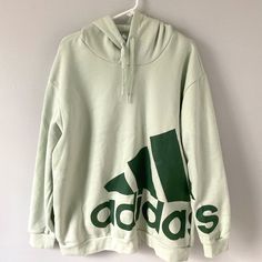 This Is An Oversized Hoodie With The Adidas Logo. It Is New With Tags. The Color Is Pale Green. Measurements Are Shown In Pictures. Oversized Green Sporty Hoodie, Green Letter Print Athleisure Hoodie, Oversized Green Sports Hoodie, Green Hooded Sweatshirt With Logo Print, Oversized Green Hoodie For Sports, Green Oversized Hoodie For Sports, Green Adidas Long Sleeve Sweatshirt, Green Adidas Sweatshirt For Winter, Adidas Green Long Sleeve Sweatshirt