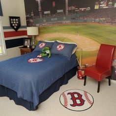 a bedroom with a baseball themed wall mural