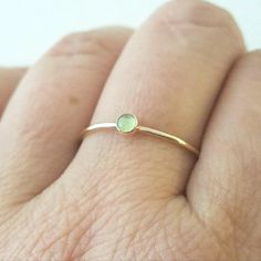 18 Gold Peridot Ring Gold Dainty Opal Ring Birthstone, Dainty Gold Opal Ring Birthstone, Stackable Yellow Gold Peridot Jewelry, Green Stackable 14k Gold Jewelry, Stackable Green 14k Gold Jewelry, Green Peridot Stackable Promise Rings, Green Opal Birthstone Ring In 14k Gold, Dainty Gold Stackable Rings With Gemstones, Minimalist Gold Emerald Stackable Ring