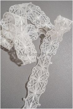 Romantic, boho inspired lace trim for bridal laces very nice to use as a bridal sash or on bridal dresses. ❀❀ CHARACTERISTICS ❀❀ Embroidered on nylon mesh Yarn: Rayon Color: off-white Listed per- 1 yards (yds) / 91,44 cm (0,91 Meter) - if you order more than 1yds, you'll get the lace in one continuous full piece.  Perfect for dress making, bridal wear, wedding gowns, bodice or curtains ❀❀ MEASUREMENTS ❀❀  Width: 4 cm / 1.5 inch  ❀❀ SAMPLE SWATCHES❀❀ If you want to check the color and quality, yo Delicate Fitted Cream Lace, Fitted Delicate Cream Lace, Cream Fitted Delicate Lace, Fitted Delicate Lace With Lace Trim, White Fitted Lace Bridal Belt, Fitted White Lace Bridal Belt, Bohemian Cream Lace With Lace Trim, Cream Bohemian Lace With Lace Trim, Ecru Lace With Lace Trim For Wedding