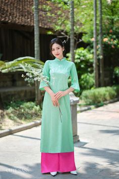 Our Gấm Collection Áo Dài is a fusion of delicacy and comfort. Made with luxurious Gam silk and is available in a size-inclusive range, this collection Áo Dài offer versatility, effortlessly transitioning from season to season.  ❣️ This set includes one Ao Dai Top and  Pants Style: Traditional  Material: Gam Silk. Little Stretch ❣️ This beautiful and modern ao dai set is perfect for any special occasions: Lunar NewYear, Mid Autumn Festival, Attending Wedding, or a Family photoshoot. ❣️ Please no Modern Ao Dai, Vietnamese Ao Dai, Autumn Festival, Mid Autumn, Mid Autumn Festival, Pants Style, American Standard, Unique Designers, Family Photoshoot