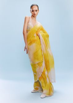 Asher Chiffon Yellow Sari Set by Dolly J, available on Indiaspopup.com Summer Traditional Georgette Pre-draped Saree, Designer Pre-draped Yellow Saree, Summer Traditional Drape Pre-draped Georgette Saree, Yellow Designer Wear Pre-draped Saree, Yellow Pre-draped Designer Saree, Elegant Summer Silk Pre-draped Saree, Summer Pre-draped Georgette Saree With Sheer Dupatta, Bollywood Style Pre-draped Saree For Summer, Yellow Fitted Organza Pre-draped Saree