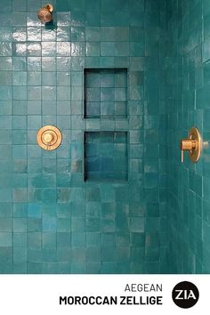 a green tiled bathroom with gold fixtures and an open window in the shower stall area