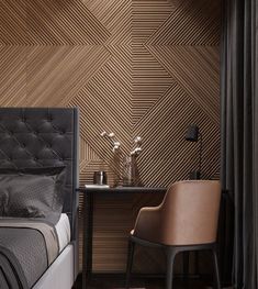 a bedroom with a bed, desk and chair next to a wall made out of wood planks