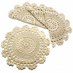 crocheted doily and placemats on white background