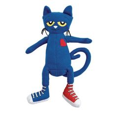 a blue cat stuffed animal with yellow eyes and red sneakers on it's feet