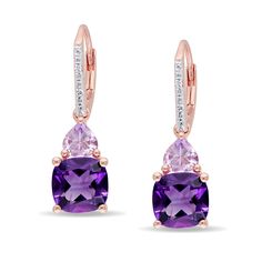 These elegant amethyst, Rose de France amethyst, and diamond earrings add an elegant touch of color to your formal and everyday ensembles. Crafted in sterling silver with rose rhodium plating, these earrings each feature a cushion cut purple amethyst crowned with a flipped heart Rose de France amethyst. Completing the design is a single row of diamonds running up the front of the post. Each earring measures 28mm in length and features a leverback closure for security. The purple amethysts each m Round Cut Diamond Earrings, Classy Earrings, Gemstone Drop Earrings, Gold Diamond Earrings, Amethyst Jewelry, Diamond Drop Earrings, Stunning Earrings, Fine Earrings, Modern Earrings