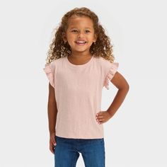 Add a sweet finish to their laidback looks with this Pucker Knit Short-Sleeve Top from Cat & Jack™. This regular-fit top in a solid hue features a casual crew neckline, short dolman sleeves with frill detailing and puckered texture for extra flair. The midweight cotton-blend fabric with added spandex offers a comfortable, flexible fit, while the pullover style allows for easy wear. Have them pair this knit tee with a range of shorts, pants or skirts for versatile outfit options. Cat & Jack™: Des Cute Cotton Knit Top For Spring, Cute Soft-washed Pink Top, Cute Pink Soft-washed Tops, Playful Short Sleeve Top, Pink Short Sleeve Cotton Knit Top, Playful Soft-washed Tops For Summer, Playful Soft-washed Summer Tops, Soft-washed Pink Top For Spring, Playful Relaxed Fit Soft-washed Tops