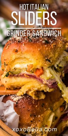 two sandwiches stacked on top of each other with the words, hot italian sliders grinder sandwich