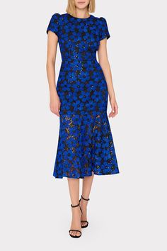 Relish in this Fall’s take on our signature floral embroidered dress—a mix of bold cobalt blue covered in black florals that serve as a mesh overlay atop a short sleeve, curve-hugging silhouette that falls to a chic midi-length hemline. Blue Floral Embroidered Midi Dress For Evening, Blue Floral Embroidery Midi Dress For Evening, Royal Blue Summer Dress For Gala, Royal Blue Dress For Summer Gala, Blue Fitted Midi Dress With Floral Embroidery, Spring Gala Royal Blue Dress, Royal Blue Spring Gala Dress, Royal Blue Dress For Spring Gala, Midi Dress Sleeves