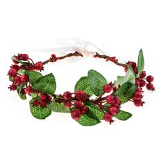 a flower crown with red berries and green leaves