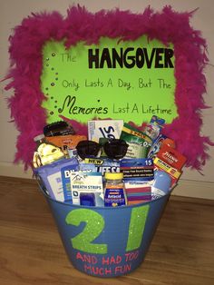 a bucket filled with lots of items next to a sign