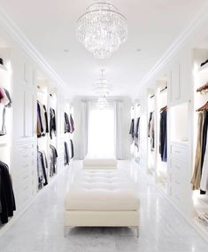 a white room with lots of closet space