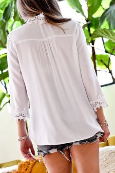 Lace trim detail blouse top -100% rayon -lace trim detail -3/4 sleeve -loose fit casual White 3/4 Sleeve Tops For Layering, Spring V-neck Top With Lace Cuffs, Summer Long Sleeve Tops With Cutwork Hem, Long Sleeve Summer Tops With Cutwork Hem, Chic Rayon Tops With 3/4 Sleeve, Chic Long Sleeve Tops With Cutwork Hem, Casual White Blouse With Lace Cuffs, Long Sleeve Tops With Crochet Trim For Layering, Casual Rayon Tops With 3/4 Sleeves