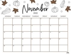 a november calendar with autumn leaves and acorns on the side, in black and white