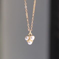 Dainty Pearl Necklace Add a touch of sparkle with our dainty pearl necklace.  This necklace is classic and timeless, making it the perfect gift!  D E T A I L S -Pearl drop approx. 6mm     -Glass pearl and gold plated -High quality 14kt gold filled delicate link necklace -spring ring closure. LENGTH Available in 16, 18 or 20 inches. *Model is wearing 16" in photos HOW TO PERSONALIZE *Select your choices from the drop down menu to create your custom design. ∙ EXTRA LOVE ∙ Handcrafted just for you Elegant Pearl Necklace For Birthdays, Elegant Pearl Charm Necklace For Birthday, Dainty Pearl Necklace For Anniversary, Elegant Pearl Drop Jewelry For Birthday, Elegant Gold Pearl Necklace For Birthday, Dainty Pearl Jewelry For Birthday, Dainty Pearl Jewelry For Birthdays, Elegant Pearl Pendant Jewelry For Birthday, Elegant Pearl Necklace For Birthday