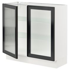 a white and black cabinet with glass doors