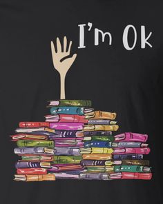 a stack of books with the words i'm ok and a hand reaching for it