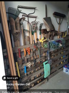 a bunch of tools are hanging on a wall