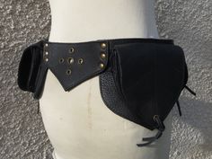 Leather festival utility belt perfect for the dancefloor or travelling.   High Quality black leather This belt is adjustable from 30-39 inch   (76 - 99 cm)     It has 4 pockets which close with zips Front 2 zip pockets 12 x 10 cm depth 3cm 1 zip pocket 16 x 10 cm depth 3cm Back (secret hidden pocket) 1 zip pocket 16 x 10 cm depth 4cm Comes in a unique gift bag . I can now send with Mondial Relais to France 5,99€ , Belgium 6,99€ , Netherlands 7,99€ , Portugal Spain 9,99€ . This service is to a pi Leather Corset Belt For Festivals, Black Steampunk Corset Belt For Festival, Black Corset Belt For Festival, Black Gothic Belt For Festival, Leather Steampunk Corset Belt For Festivals, Steampunk Leather Corset Belt For Festivals, Black Leather Festival Belts, Black Leather Belts For Festivals, Steampunk Black Corset Belt With Belt Loops