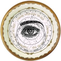 a plate with an image of the eye and stars on it, all in different colors