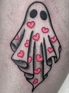 a ghost with hearts coming out of it's legs is shown in this tattoo design