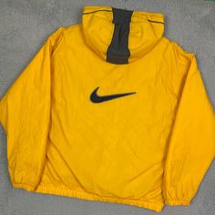 Vintage 90s Nike Big Swoosh Puffer Jacket Size 2xl. 27 Inches Pit To Pit. 30 Inches Length. 8.5/10 Condition. Light Wear Any Questions Feel Free To Ask Will Ship Within 24 Hours Of Purchase. Vintage Nike Puffer Jacket, Nike 90s Jackets, Vintage Yellow Windbreaker For Winter, Nike Moisture-wicking Streetwear Outerwear, Jackets Streetwear, Nike Moisture-wicking Nylon Outerwear, 90s Nike, Men's Coats And Jackets, Puffer Jacket