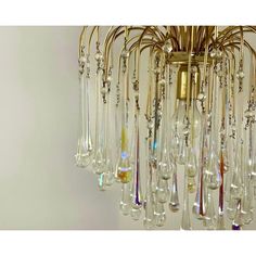 a chandelier with glass drops hanging from it