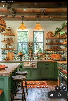 a kitchen with lots of green cabinets and wooden flooring on the walls, along with two stools in front of an island