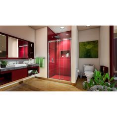 a bathroom with red cabinets and a white toilet sitting next to a walk in shower