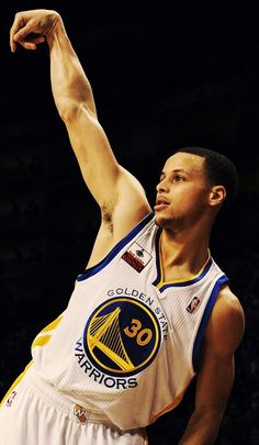 a basketball player getting ready to dunk the ball