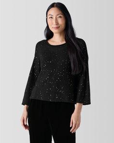 Workdays to weekends, holiday planning to holiday parties, you'll sparkle your way through the season in this comfy cropped sweater. Soft and lightweight in Italian merino wool woven with micro-sequins for subtle shine.  By EILEEN FISHER. Jewel neckline. 3/4 sleeves with drop shoulders. Winter Evening Knit Top, Cropped Sequin Top For Fall, Sequined Cropped Top For Fall, Set Apart, Bateau Neck, Sequin Sweater, Garnet Hill, Holiday Planning, Jewel Neckline