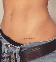 a woman's stomach with an inscription on it