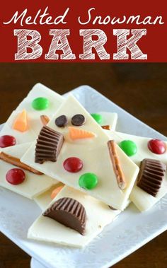 some white chocolate bars with candy on top and the words melted snowman bark