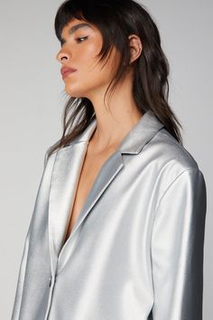 You mean business. Feel fierce in our faux leather blazer, in a striking silver colorway, with a sleek design and button detailing. Pair it with the matching pants for a look that will take you from party nights to upcoming events and occasions. Premium Faux Leather Metallic Tailored Blazer High Quality Faux Leather Unique Metallic Coloring Flattering, Relaxed Fit Contrasting Button Details Button Front Fastening Matching Pants Sold Separately Model wears a size M (US size 6/UK size 10). Silver Blazer, Faux Leather Blazer, Oasis Fashion, Tailored Blazer, Matching Pants, Leather Blazer, Upcoming Events, Fashion Face, Sleek Design