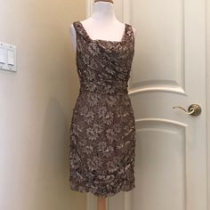 Nwot Express Dress Is A Stretch Lace Fabric, With A Bronze Like Color, And Flattering Gathers At Back And Bust Area . Fully Lined , Super Comfortable Cocktail Dress Is In New Condition. See Close Up Photos For Colors And Details. Elegant Brown Sheath Mini Dress, Brown Lace Party Dress, Express Clothing, Express Outfits, Stretch Lace Fabric, Color Lines, Close Up Photos, Express Dresses, Stretch Lace