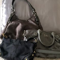 Coach Three Bag Bundle For $200 Or If Purchased Separately: 1. Gray Hobo Bag New Never Used No Tags, $100 2. Black And Gold Shoulder Bag, Like New No Wear And Tear Used A Few Times $60 3. Gray Speedy Bag With Shoulder Strap, Minor Scratches On Hardware $70 All Bags Are In Impeccable Condition And Come From A Smoke Free Home. Designer Gray Bags, Designer Gray Bag With Branded Hardware, Gray Bag With Branded Hardware For Daily Use, Gray Shoulder Bag With Branded Hardware, Gray Shoulder Bag With Branded Hardware For Everyday, Coach Gray Shopping Bags, Chic Gray Coach Bag, Gray Coach Satchel Bag, Gold Shoulder Bag