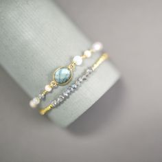 The ultimate arm candy and completely adjustable to fit anyone. Made with sparkling bezel gemstones and tiny stone accents. Gorgeous alone or stacked. We've got plenty of options to create a unique look full of color and gems! Check out some of our inspiration to get ideas on how to combine them. - Labradorite, Peach Moonstone and Opal Quartz- Adjustable slider clasp- 14k gold plated over .925 Italian fine sterling silver chain- Made in New York CityThe unique nature of real gemstones make each Layering Jewelry, Bracelet Sets, Stacking Bracelets, Gems Bracelet, Labradorite Bracelet, Unique Nature, Simple Bracelets, Stackable Bracelets, Peach Moonstone