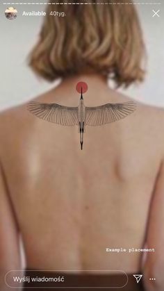 the back of a woman's body with an image of a bird on it