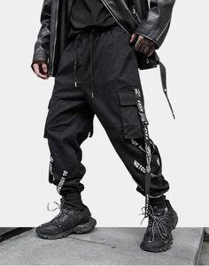 Ribbon pants Techwear Joggers With Side Pockets, Cyberpunk Cargo Pants For Streetwear, Black Cyberpunk Cargo Pants For Streetwear, Cyberpunk Streetwear Parachute Pants With Cargo Pockets, Winter Techwear Parachute Pants, Baggy Techwear Sweatpants For Outdoor, Winter Baggy Cargo Pants For Sports, Winter Sports Baggy Cargo Pants, Black Cotton Cargo Style Joggers