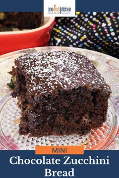 chocolate zucchini bread on a glass plate with the words, mini chocolate zucchini bread