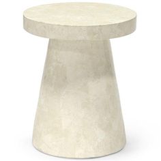 a white table with a round top on a white background, it appears to be made out of marble