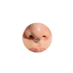 an ear with a nose ring attached to it